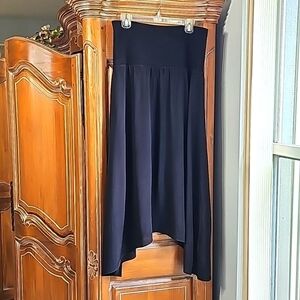 Cabi black skirt. Shark bite hem. Size medium.  Built in slip.
